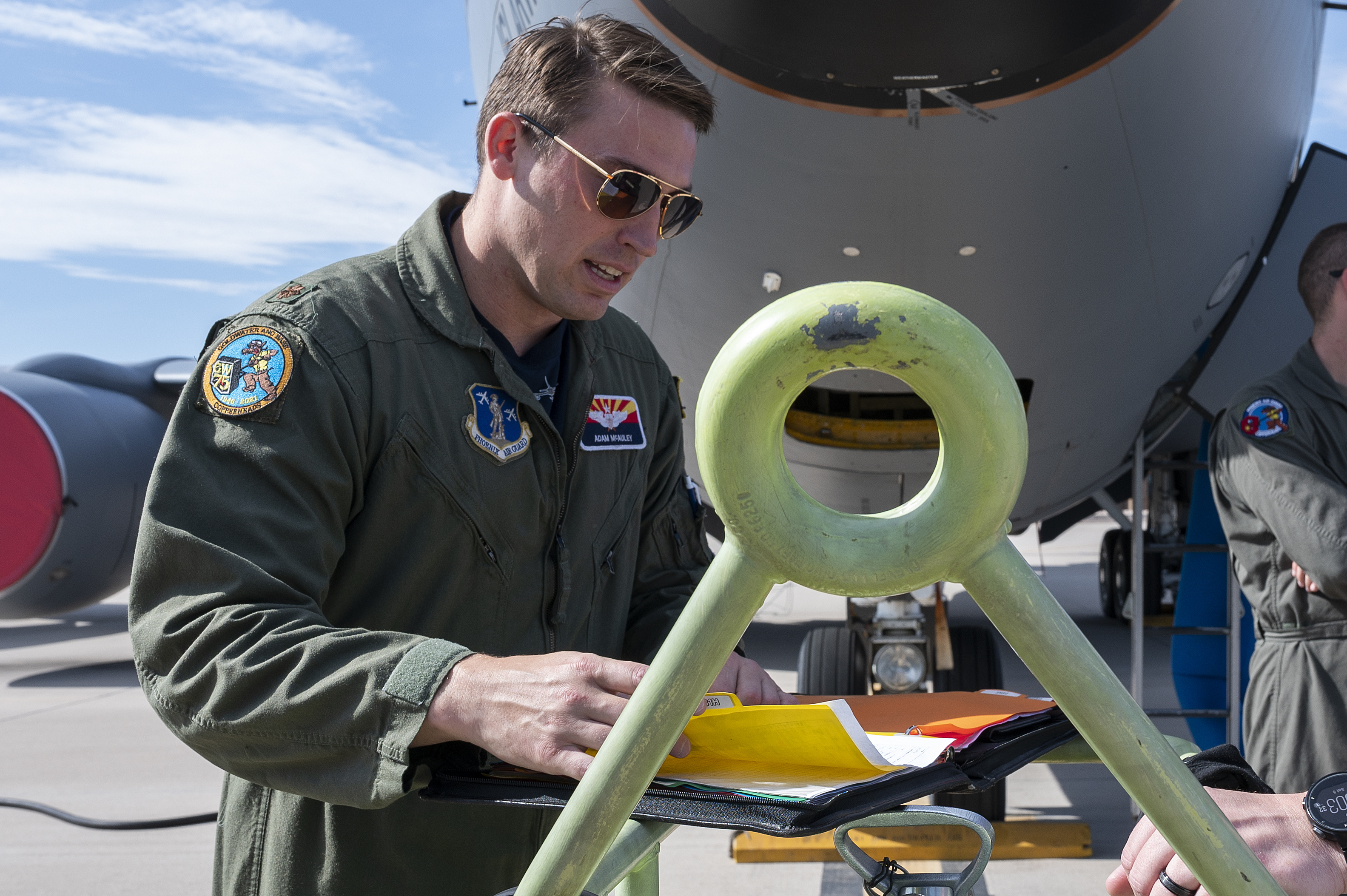 military Air Force pilot doing a pilot checklist