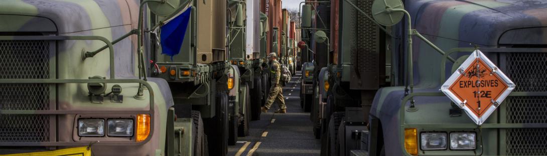 1120th Transportation Battalion. military cargo trucks lined up information