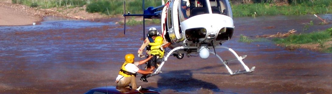 helicopter rescue flooded car