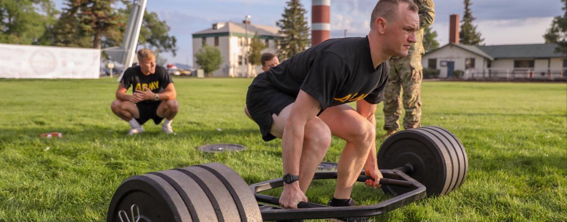 Soldier conducts a dead lift exercise during a physical fitness assessment at Camp Navajo.